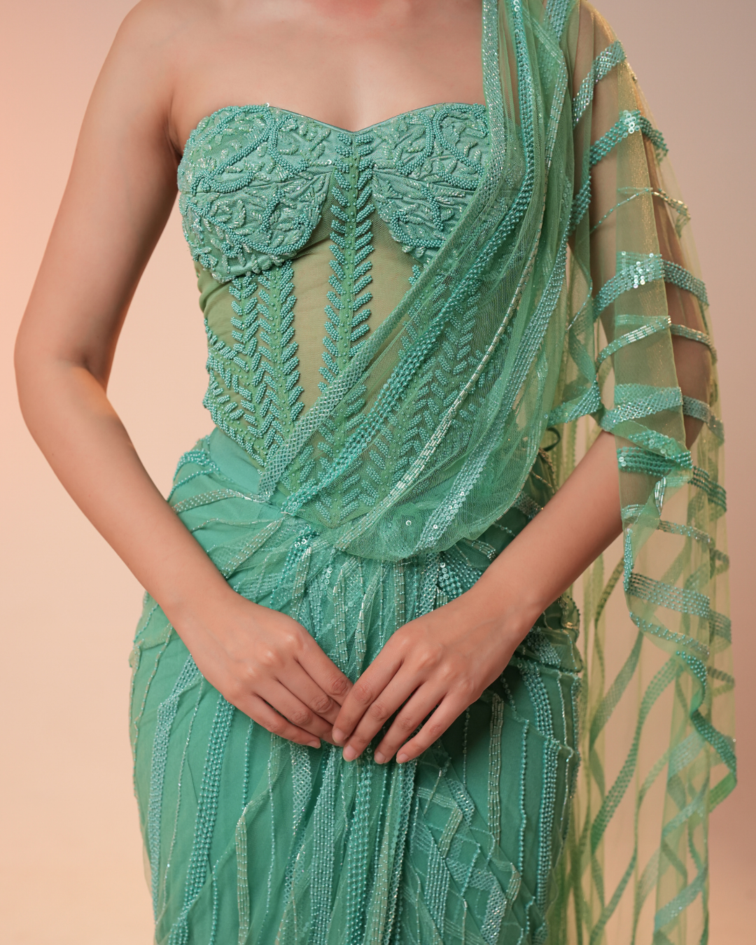 TURQUOISE DRAPED SAREE WITH CORSET