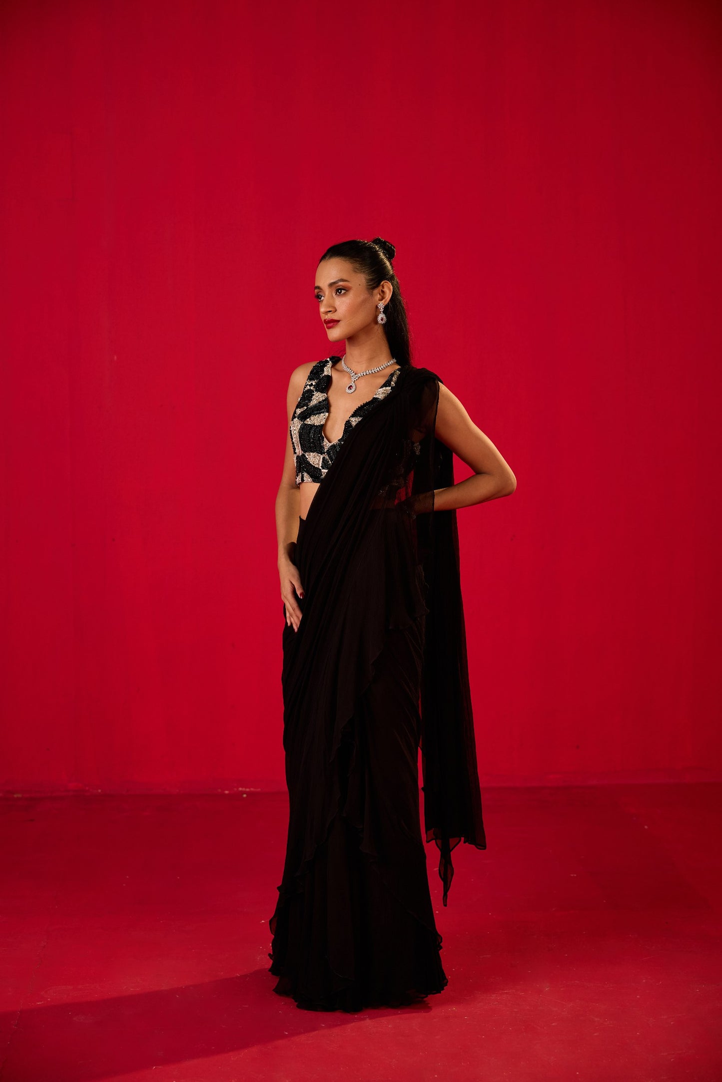 BLACK PLAIN RUFFLED STITCHED SAREE WITH EMBROIDERED BLOUSE