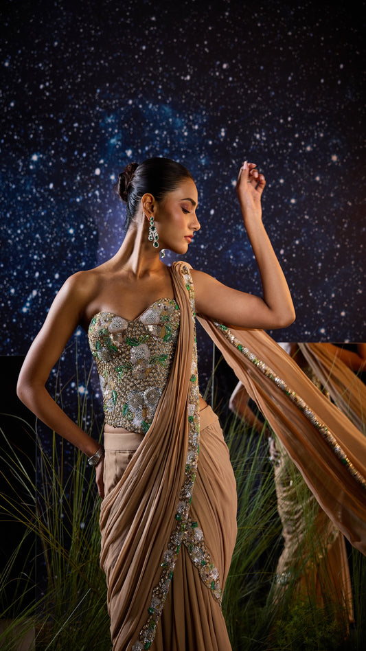Woman in a glamorous dress with a starry night background
