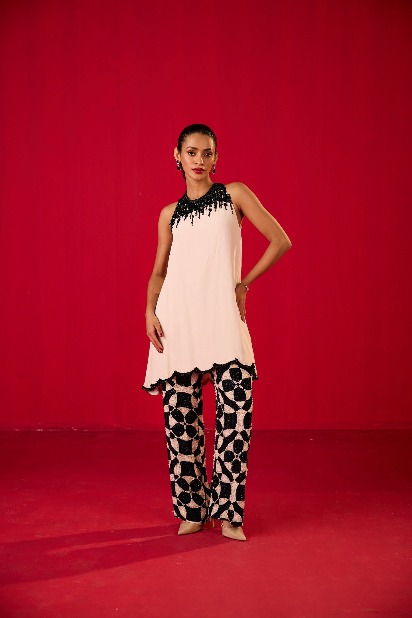 OFF WHITE CREPE TOP WITH PRINTED FULLY  EMBELLISHED TROUSERS