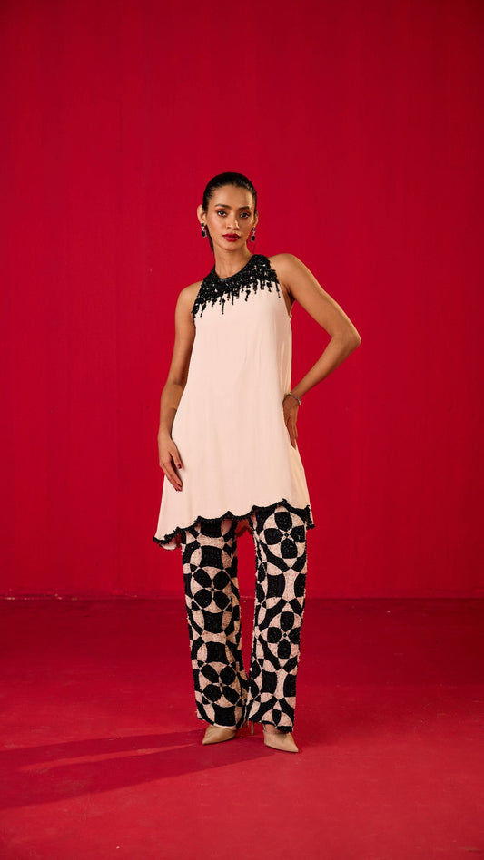 OFF WHITE CREPE TOP WITH PRINTED FULLY  EMBELLISHED TROUSERS